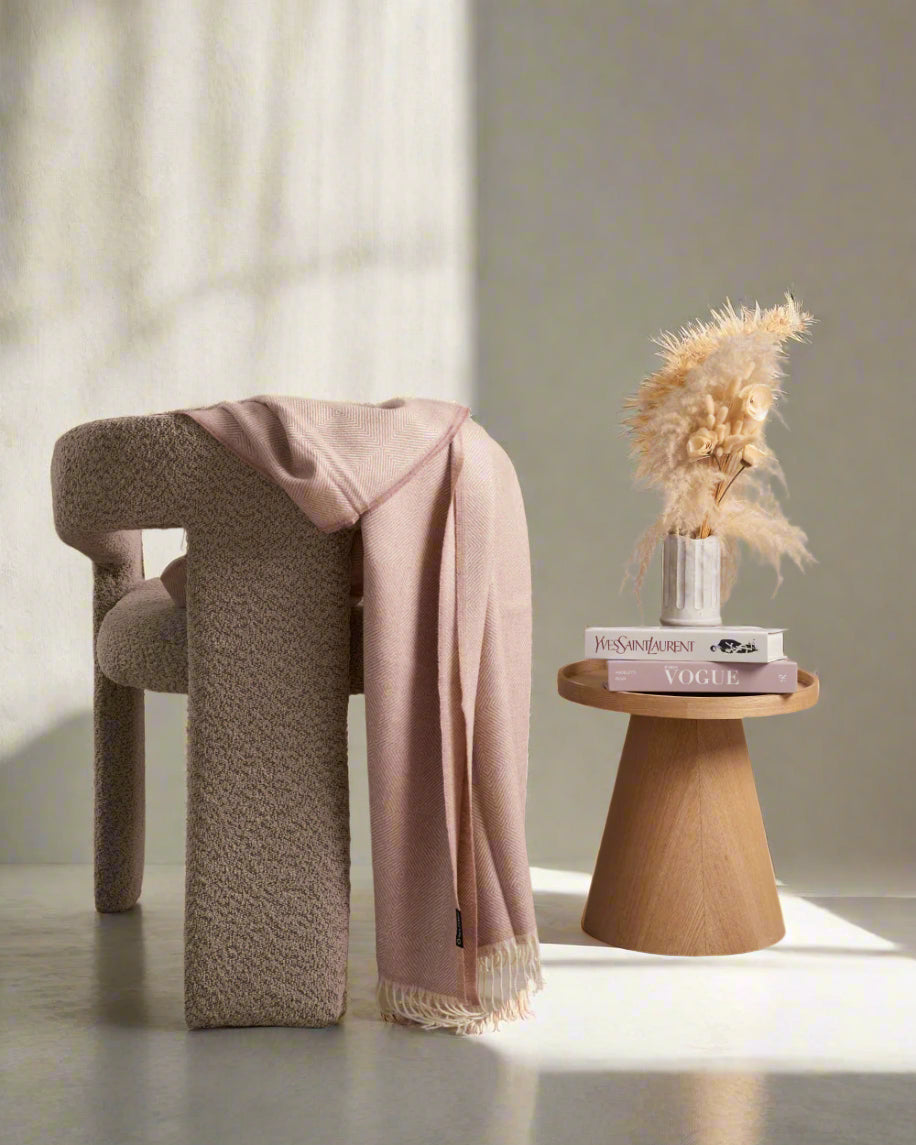 DUSTY PINK ALPACA BLANKET IN A CHAIR 