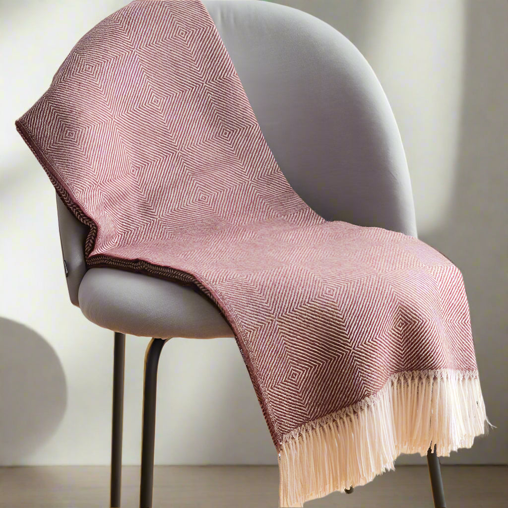 alpaca blanket in a grey dining chair 